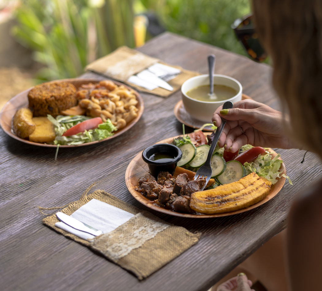 Woman eating plate of food