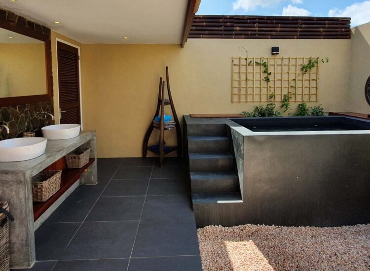 Luxurious outdoor spa area with hot tub