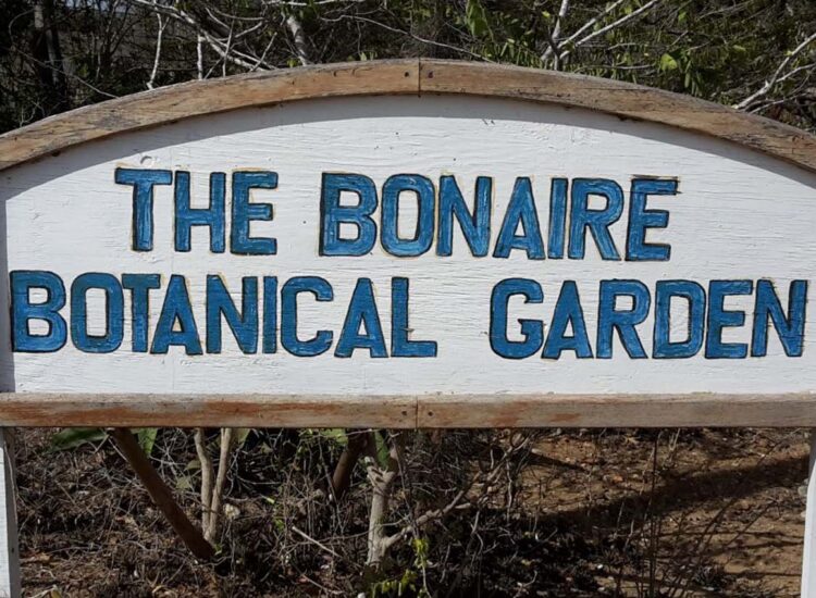 Large white sign with blue font