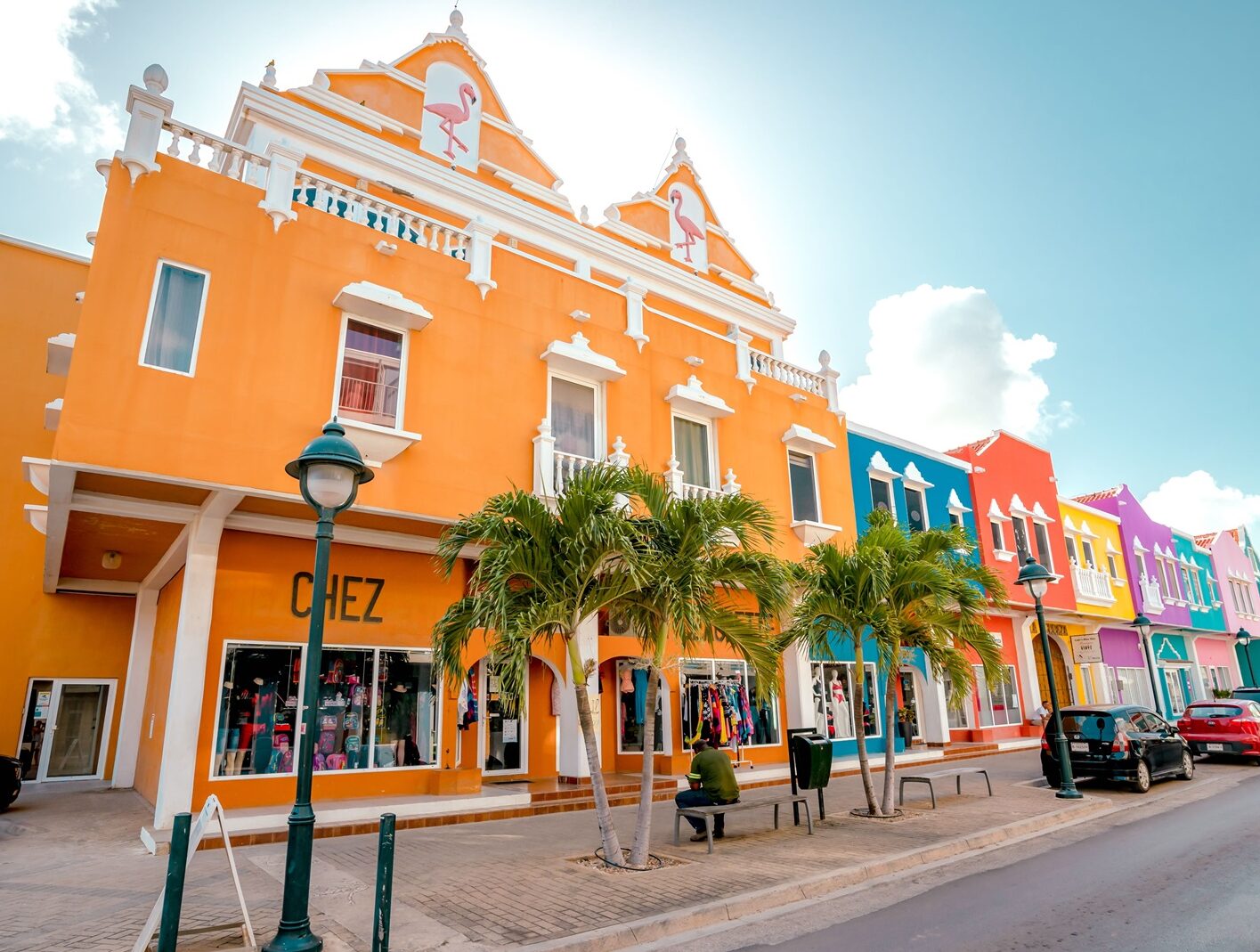 Streets of downtown Kralendijk with colorful buildings and lively local atmosphere.