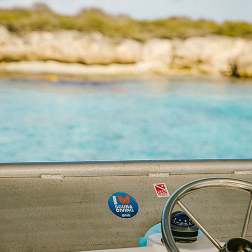 Up-close shot of a boat steering wheel