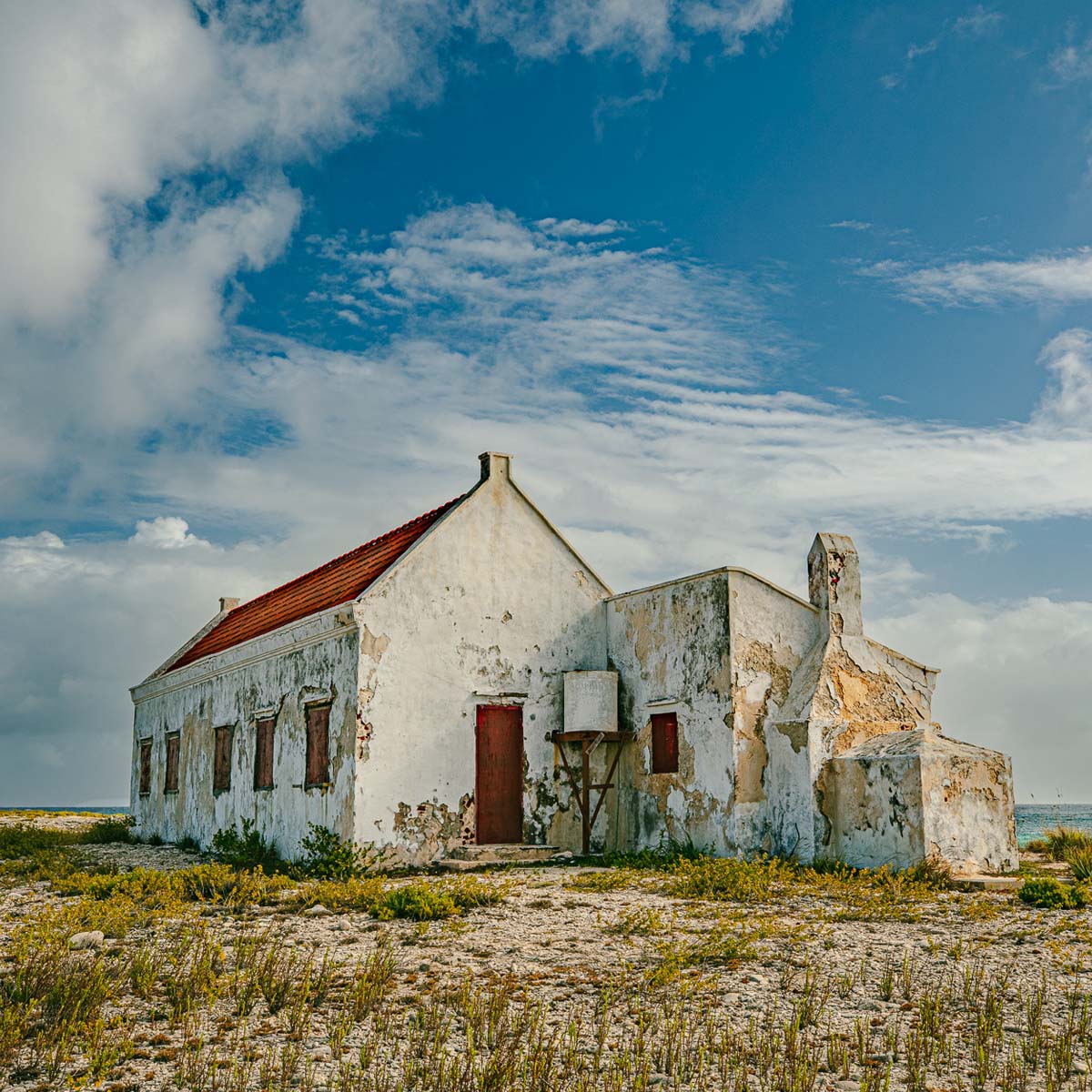 Abandoned building on beach desert