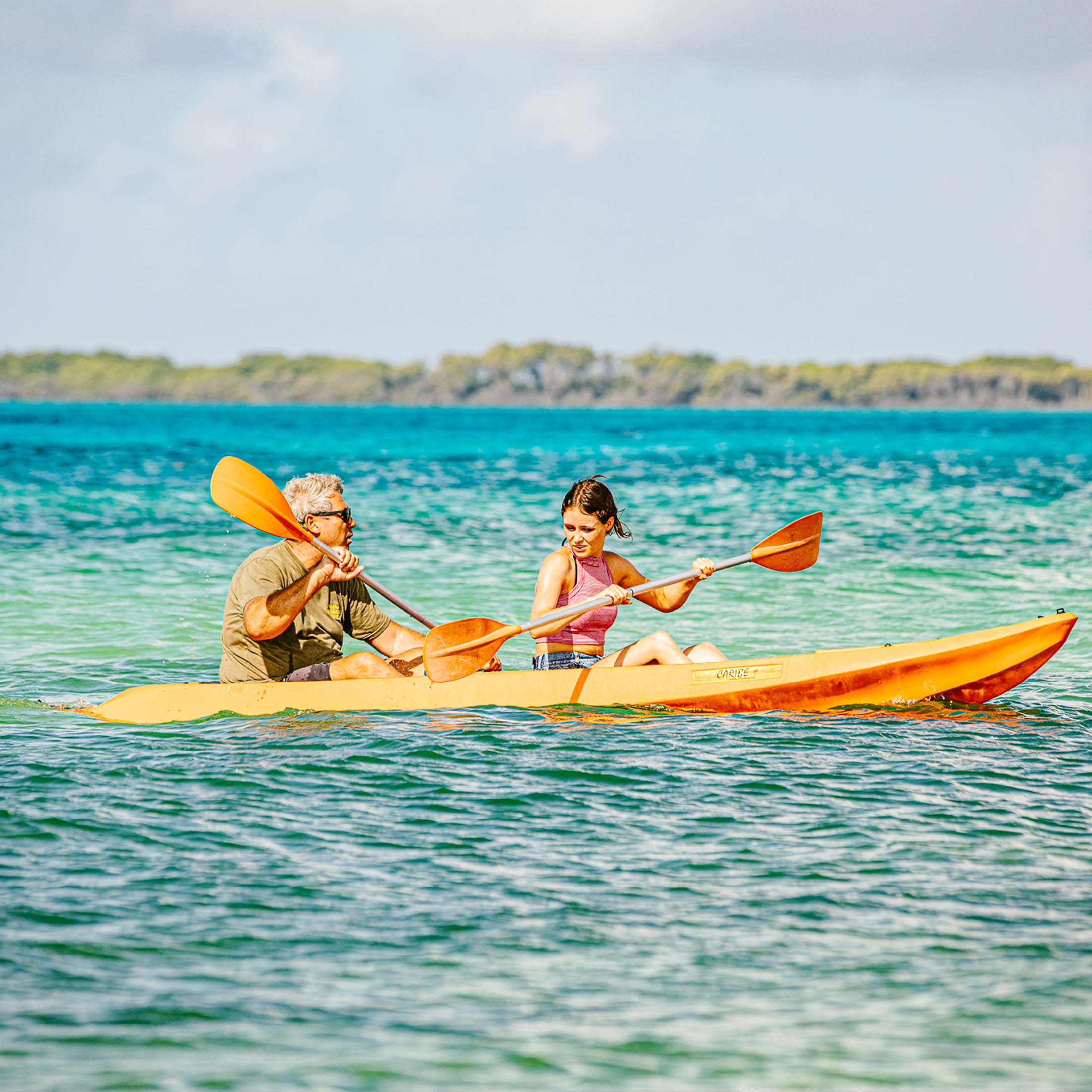Male and female kayaking